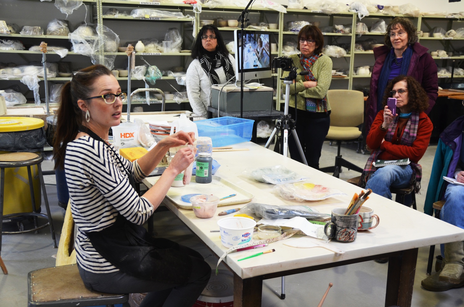 Visiting artist Jessica Brandl leads a workshop at the Harvard Ceramics Studio in Allston. Brandl uses drawing, painting, and ceramics to create art laden with powerful visual imagery.