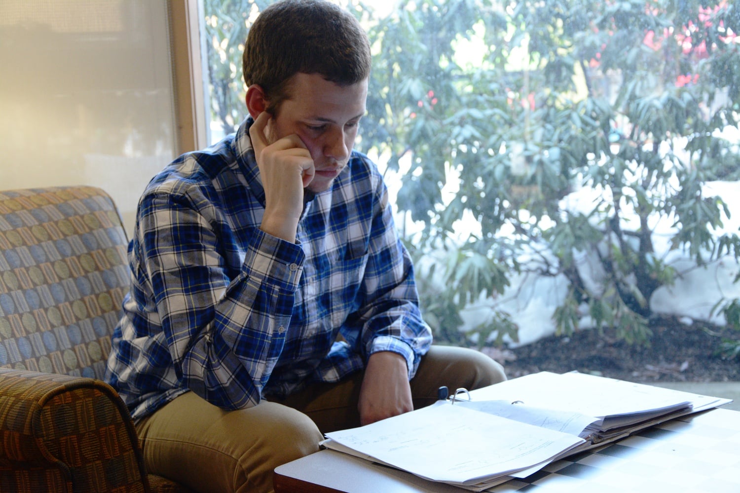 Benjamin C. Barnett ’17 ponders the mechanisms behind certain reactions on his organic chemistry problem set in the Quincy Junior Common Room on Sunday afternoon. 