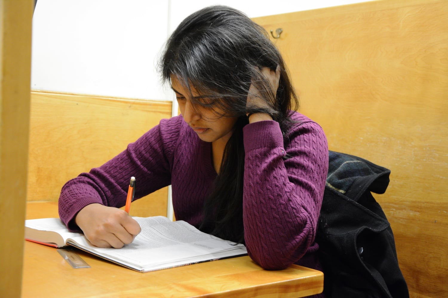 Varsha Varman ’18 studies for her SLS 20 exam in the basement of Lamont Library on Saturday afternoon. 
