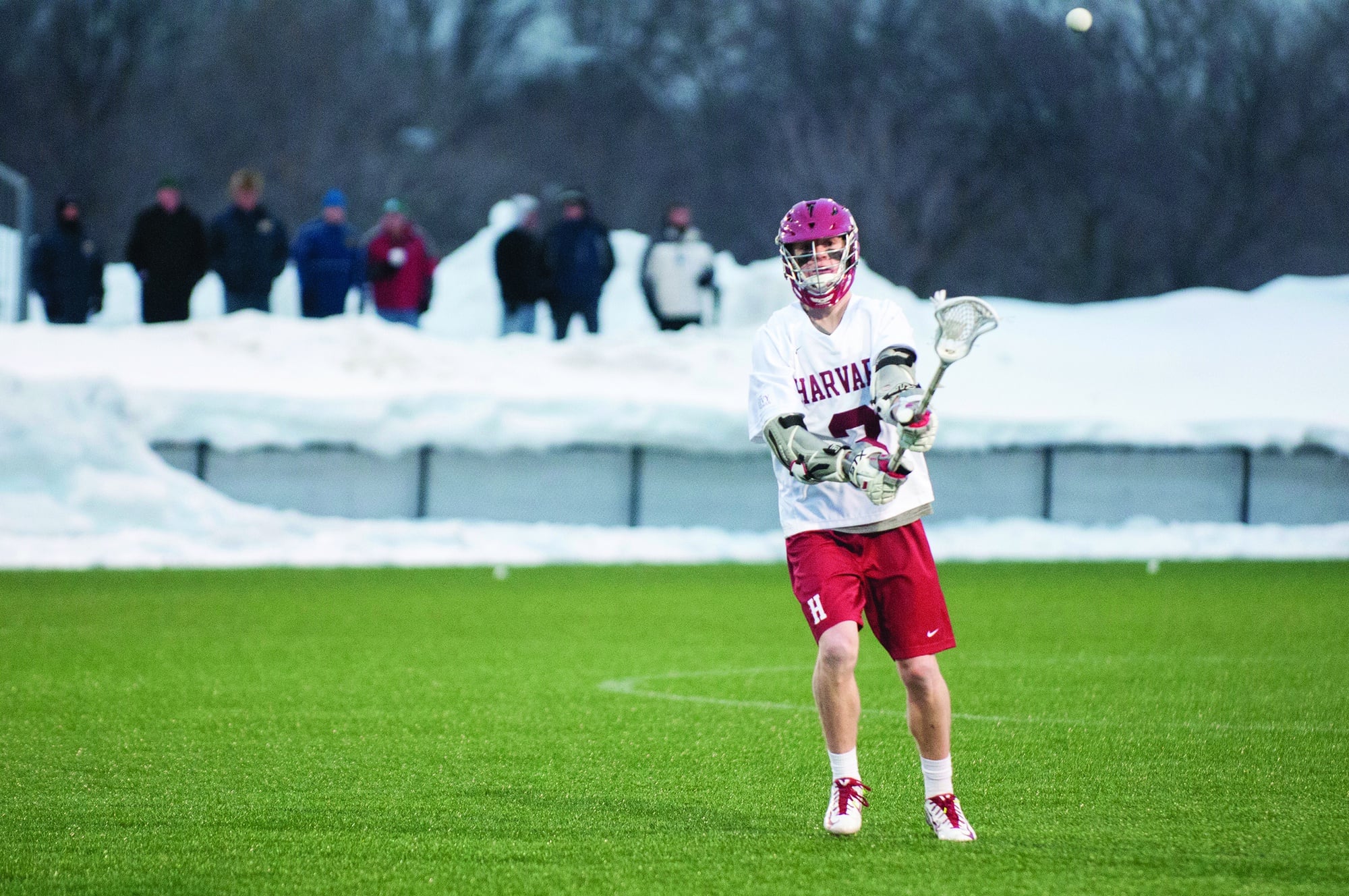 Junior atackman Devin Dwyer, shown here on March 3 against Quinnipiac, tied Harvard's single game marks in assists and points as the Crimson outscored the Crusaders, 14-4, in the second half.