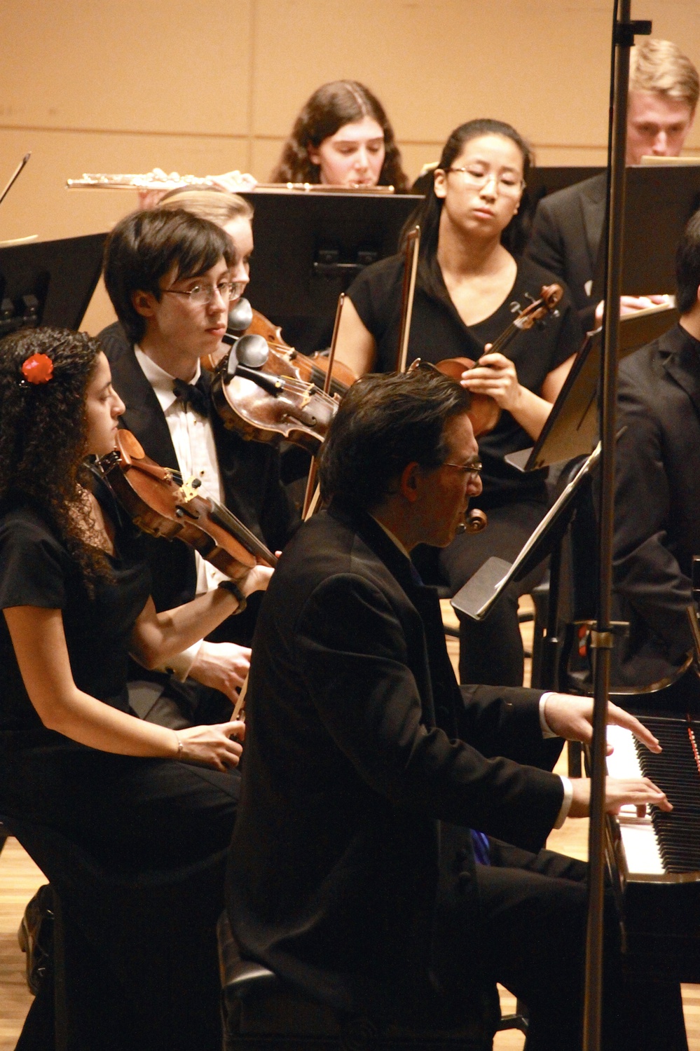 Renowned pianist Max Levinson performs a piano solo with the Bach Society Orchestra on Saturday.