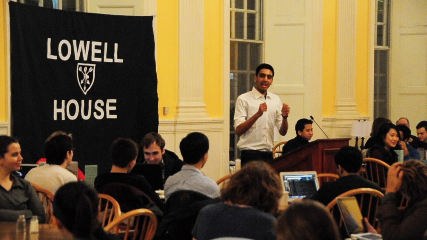 UC Vice President Dhruv Goyal delivers a speech entitled "State of the College" in Lowell dining hall Monday night. The annual Lowell House speeches were designed to encourage intellectual expression in house life. 