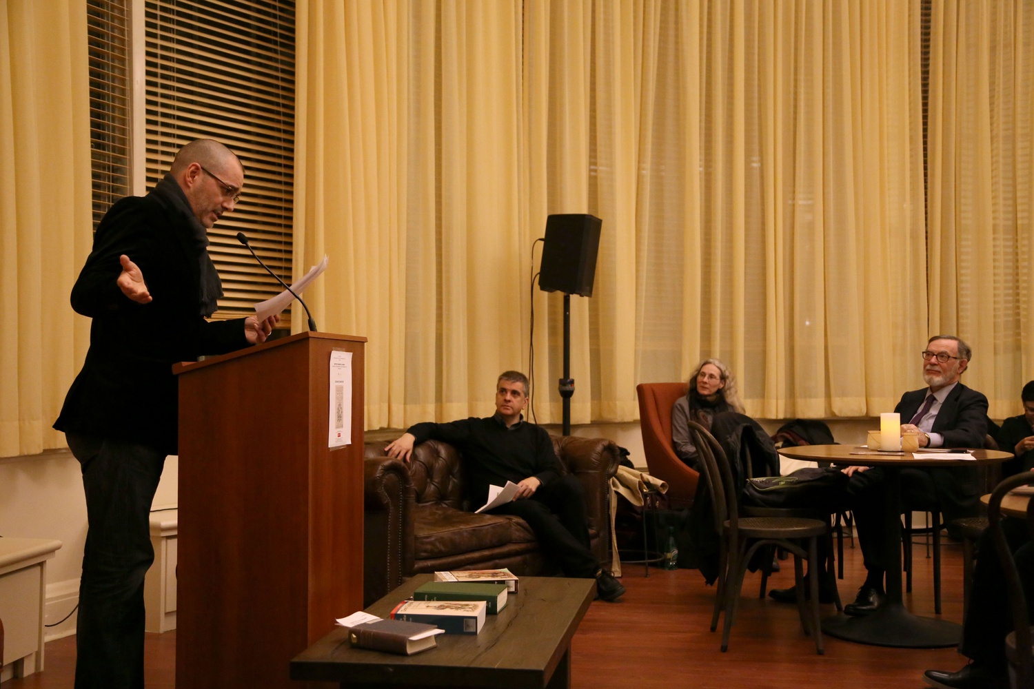 Assistant Professor Daniel A. Oteiza reads a section of Don Quijote during a Cervantes Marathon in the Barker Center Arts Cafe on Wednesday evening. The Instituto Cervantes Observatorio and Department of Romance Languages and Literatures hosted the event. 