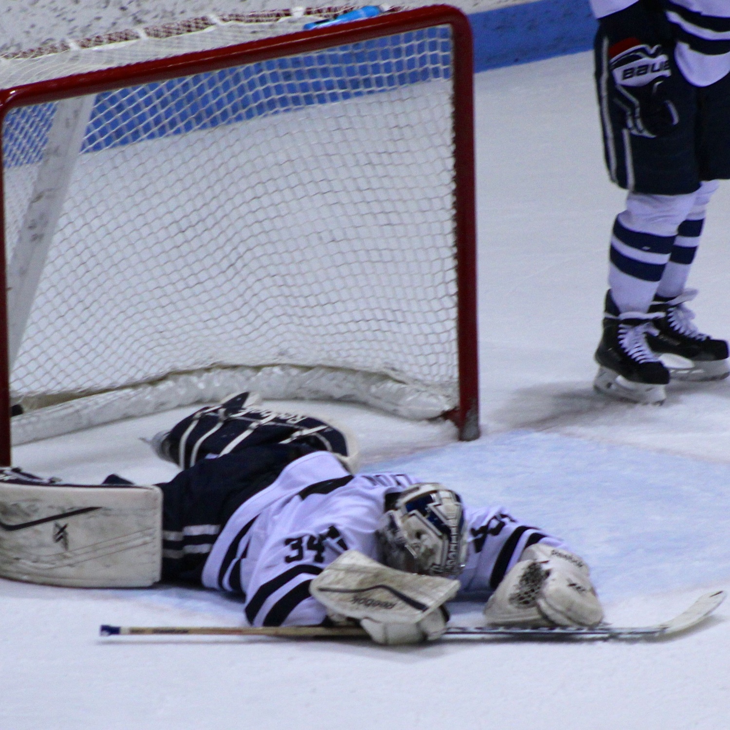 Yale's Alex Lyon reacts after Vesey's overtime winner. The sophomore goaltender entered the weekend undefeated against Harvard over eight meetings.