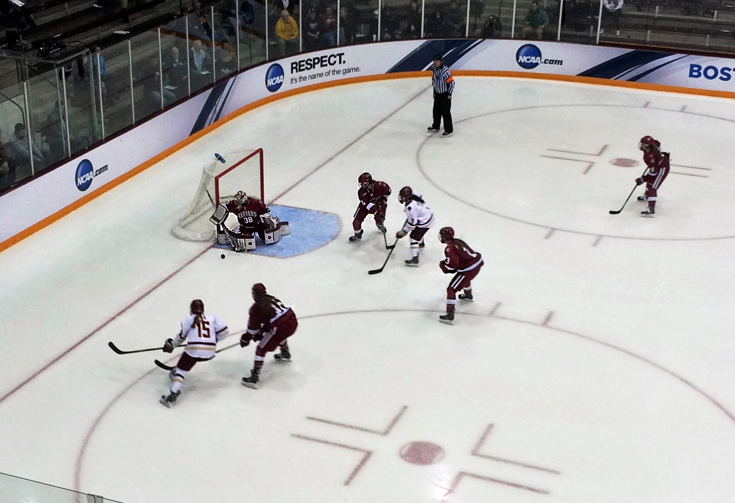 Boston College forward Emily Field (bottom left, in white) had the Eagles' only goal against the Crimson. 
NCAA Division I scoring leader Alex Carpenter had nine shots for Boston College, and fellow forward Halley Skarupa had 10, but neither could get the puck past Harvard goalie Emerance Maschmeyer.