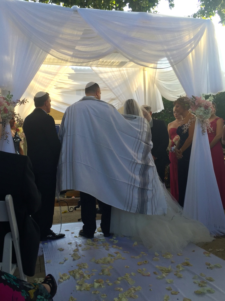 I started off my spring break with my cousin’s wedding. My cousin Josh Grossman is standing under the chuppah, a traditional covering in Jewish weddings, with his new wife, Tami.