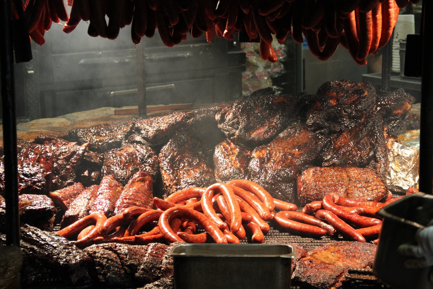 During spring break I visited The Salt Lick, a popular barbecue restaurant in Driftwood, Texas. Inside is a wood-fired pit where meat is kept warm after a long smoking process.