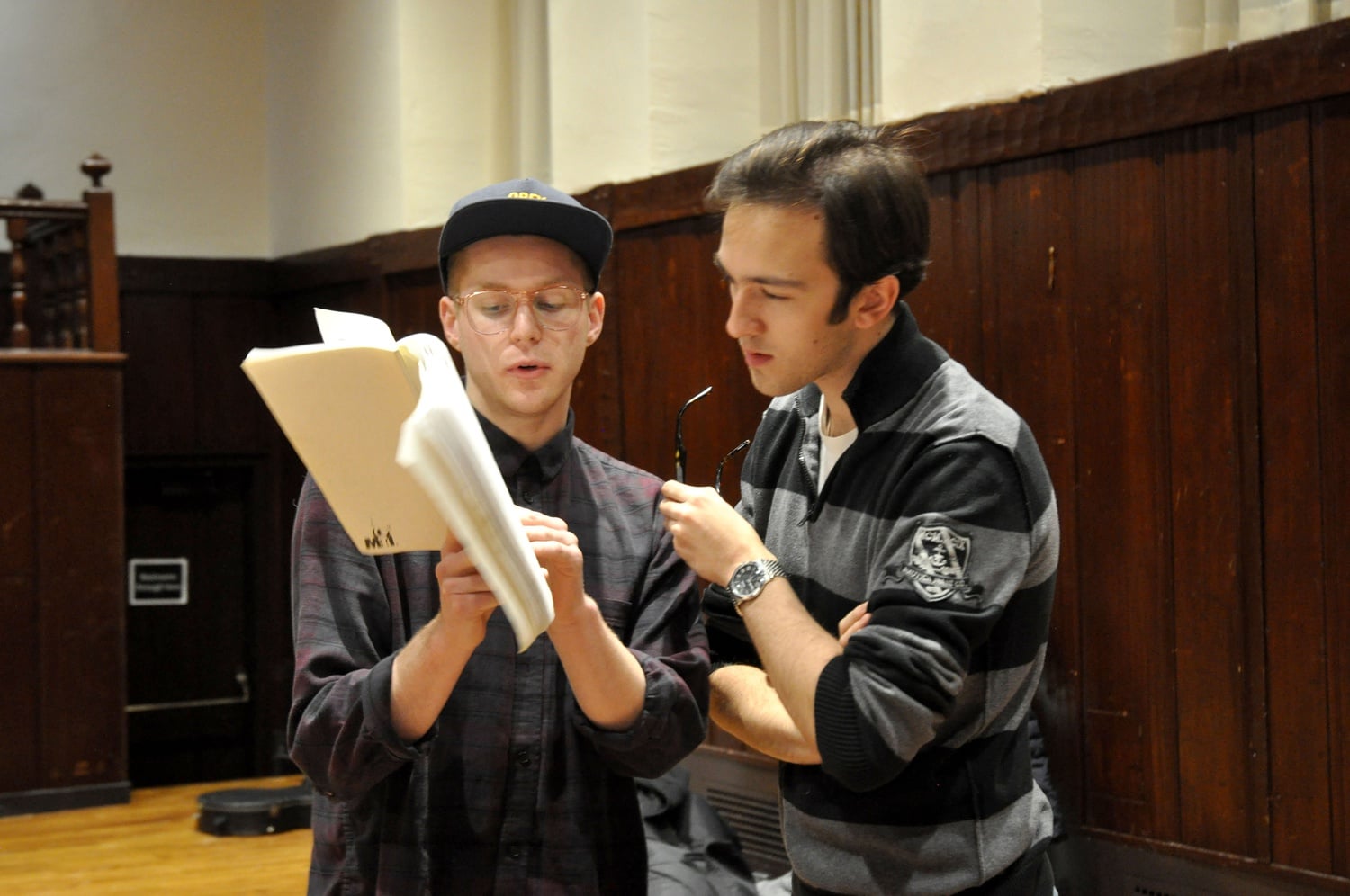 The male lead of “The Last Five Years,” Joe C. Viola, left, consults director, Steven Kunis ’17, right, during a rehearsal for the production, which will open April 2.