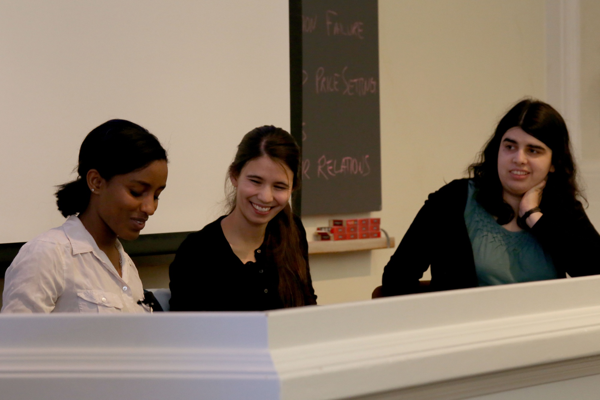 “There’s a lot of math out there, and there’s not much of us to understand it,” said Alison Miller, right, a Harvard mathematics postdoctoral fellow, “We need you to keep doing it.” Miller, former Crimson editor Rediet Abebe ’13, left, and Hilary Finucane ’09, center, discussed the role of women in the Harvard math department on Wednesday at an event hosted by the Harvard Undergraduate Mathematics Association.
