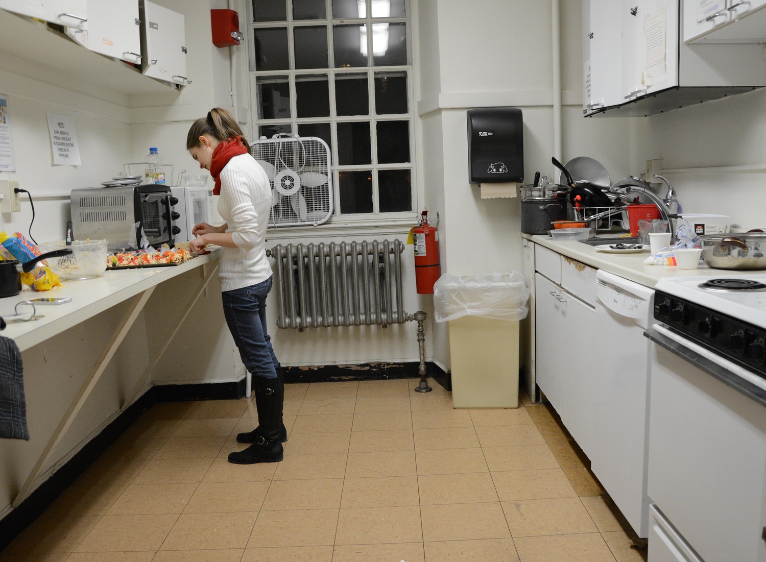 Lynette G. Bye '16 prepares candy sushi to prank her friends on April Fools' Day in the Eliot House Kitchen.