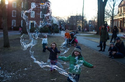 Cover image for Children Play with Bubbles in the Yard