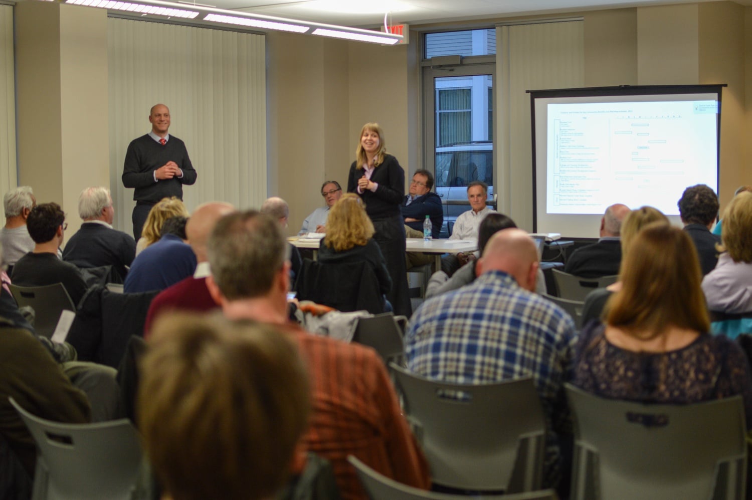 Representatives from the Boston Redevelopment Authority, left, including Gerald Autler addressed members of the Harvard-Allston Task Force during its first meeting in over 100 days on April 8 to discuss the North Allston/North Brighton Housing Stabilization Program, ongoing construction and demolitions at the SEAS complex and Charlesview apartments, and the renewal of Everett Street.