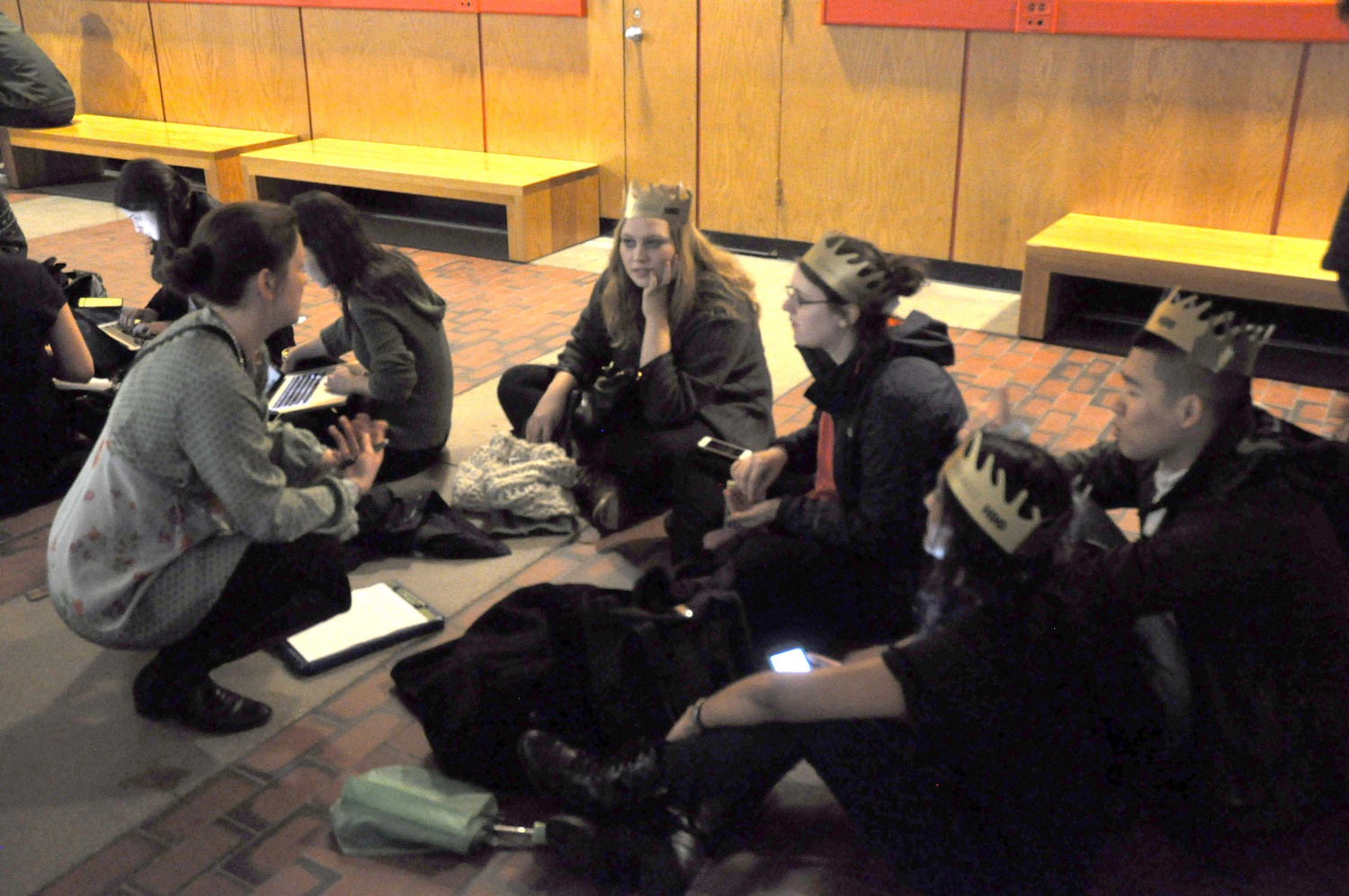 Laura C. Dechant, center, account manager at Philo, a television-streaming site, gets feedback from students as they wait in line in the Science Center for a pre-screening of the HBO series Game of Thrones. Philo, in partnership with the Harvard Student Agencies and HBO, screened a pre-screening of the series on Wednesday night.