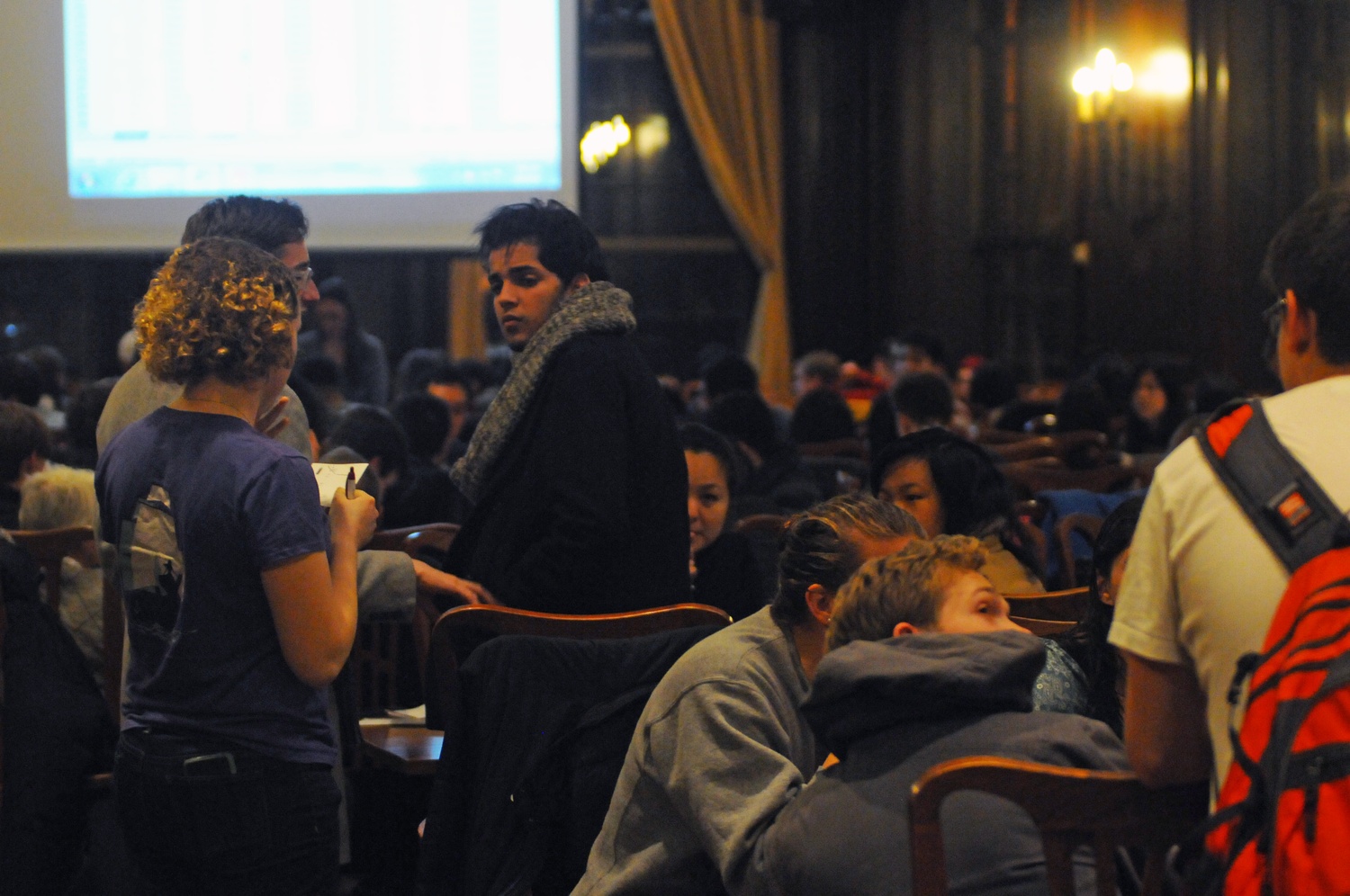 Students gather in Adams dining hall in anticipation of room assignments from the housing lottery. Many housing lotteries have taken place this week.