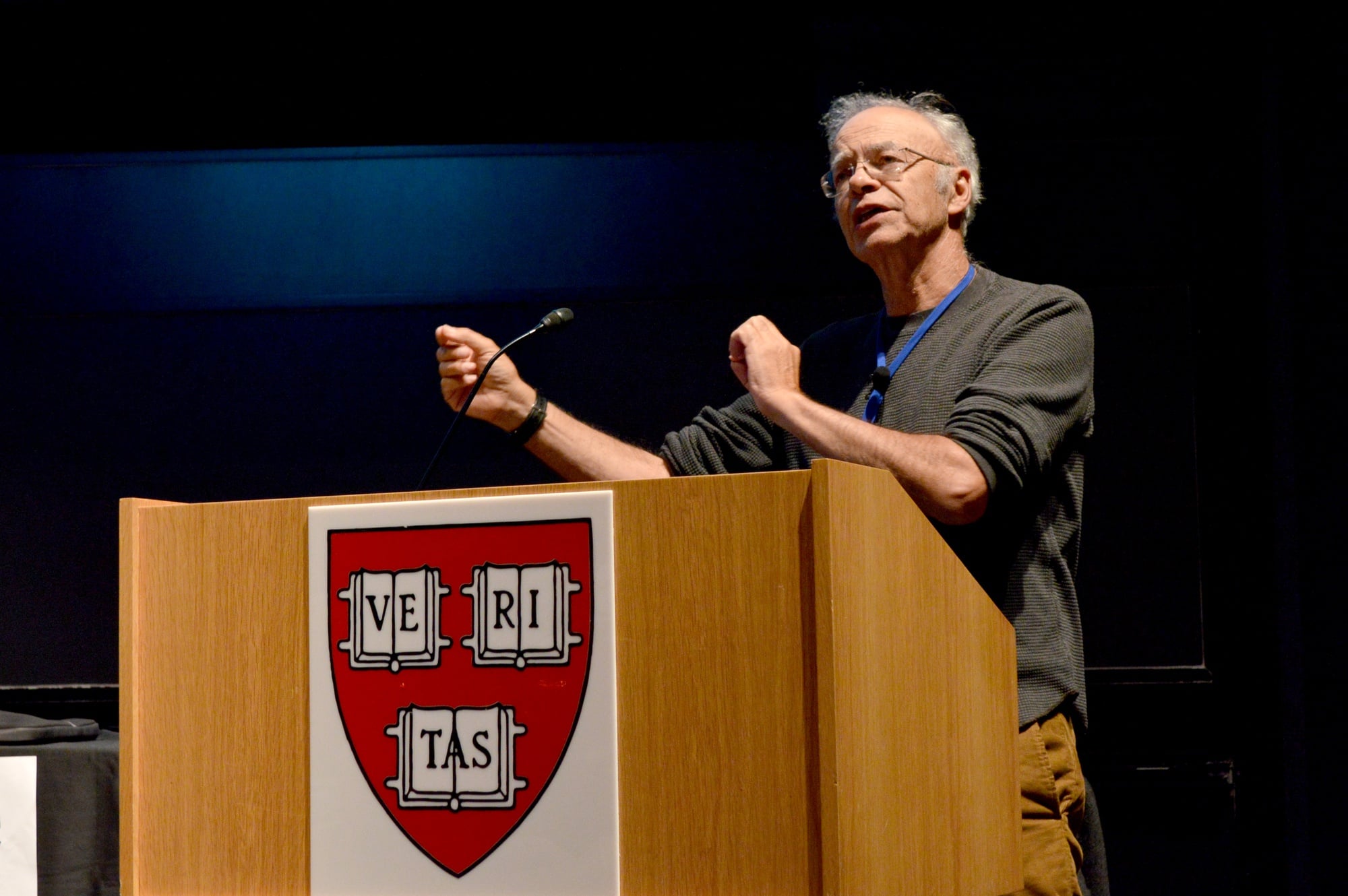 Philosopher Peter A. D. Singer speaks to a packed audience about effective altruism on Sunday night.  The event was part of Harvard Effective Altruism Week.