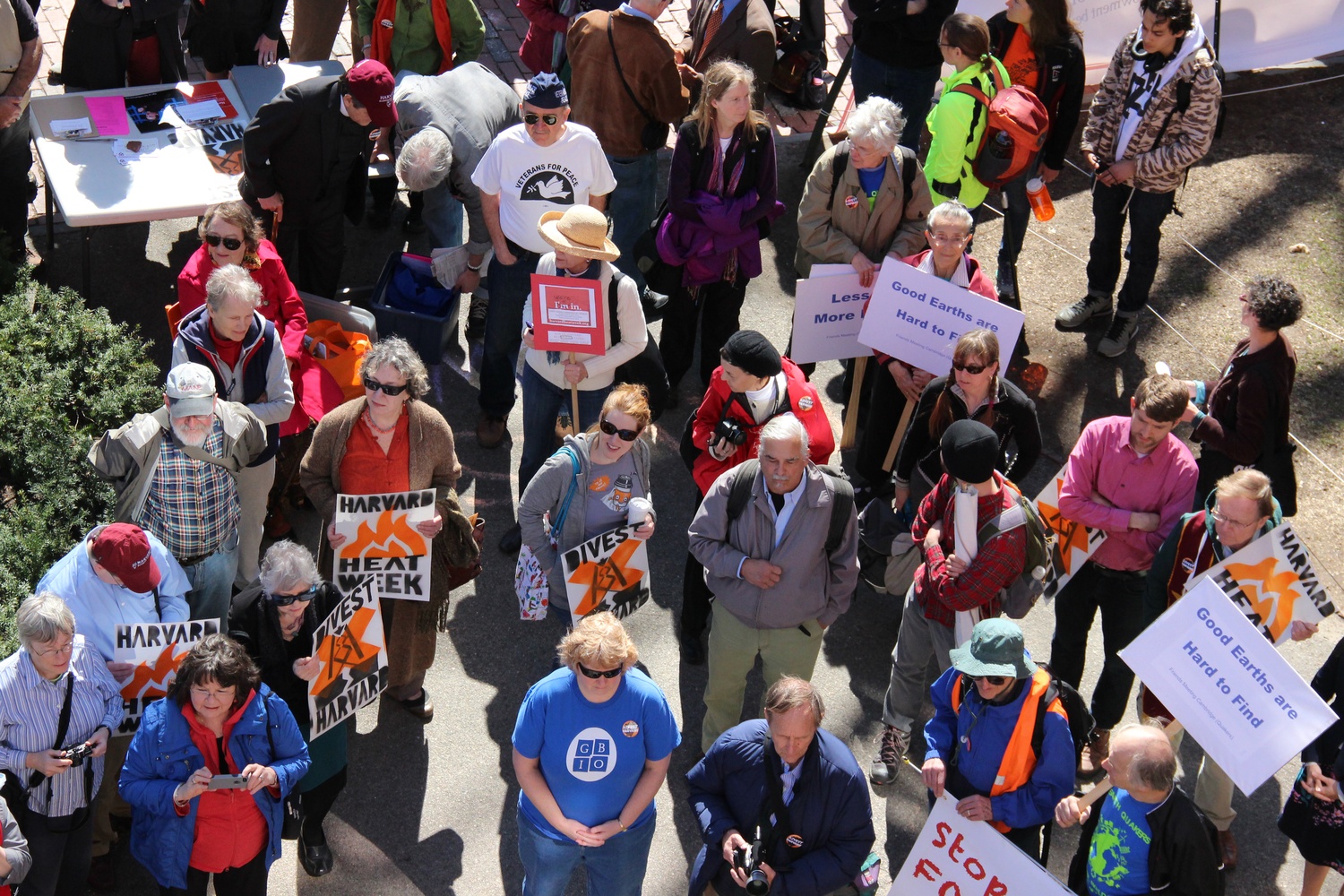 Protesters attend a "Faith Day" rally in front of Massachusetts Hall. The event took place Wednesday morning as part of Divest Harvard's "Harvard Heat Week."