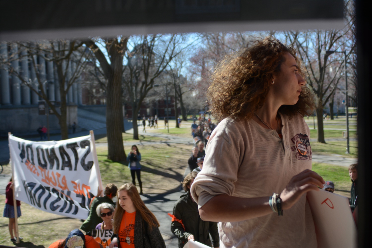 Chloe S. Maxmin '15 leads a group of Divest Harvard protesters into Emerson Hall in an attempt to confront University President Drew G. Faust, who attended an event in the building.