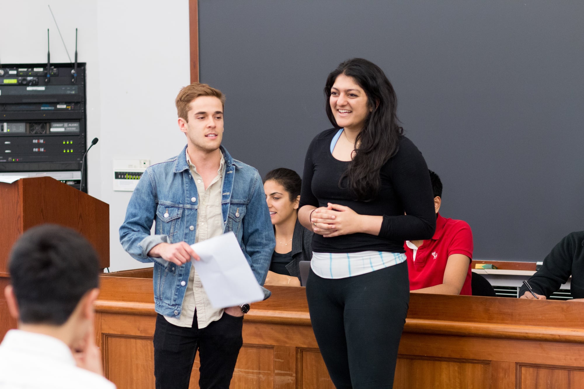 Daniel V. Banks ’17 and Shaiba Rather ’17, co-chairs of the UC’s Student Initiatives Committee, invite “Harvard Project” winner Savannah M. Fritz ’17 to speak in front of the Council.