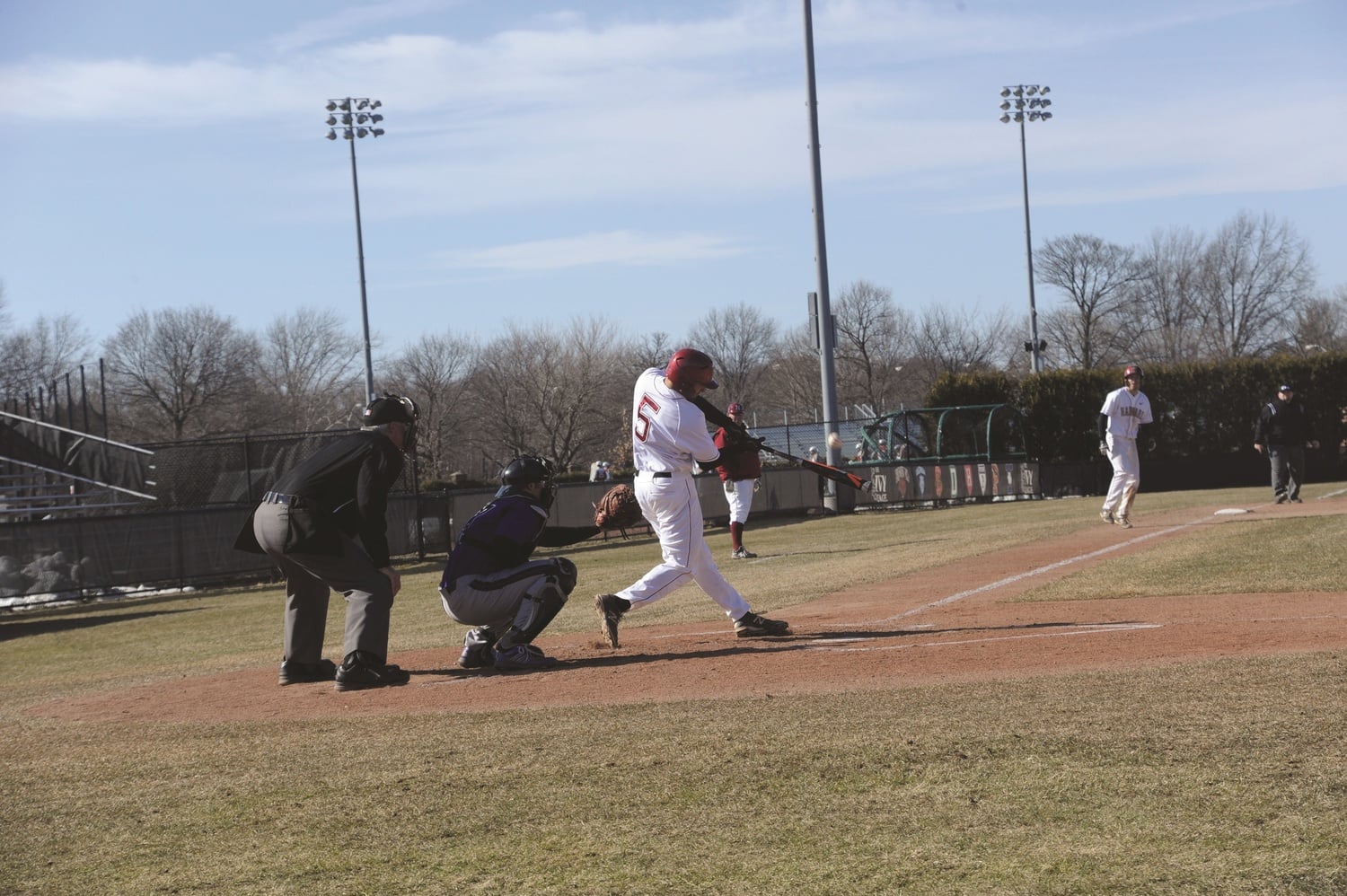 Crimson senior catcher Ethan Ferreira, pictured against Holy Cross on April 1, had two runs batted in Saturday afternoon in game one.