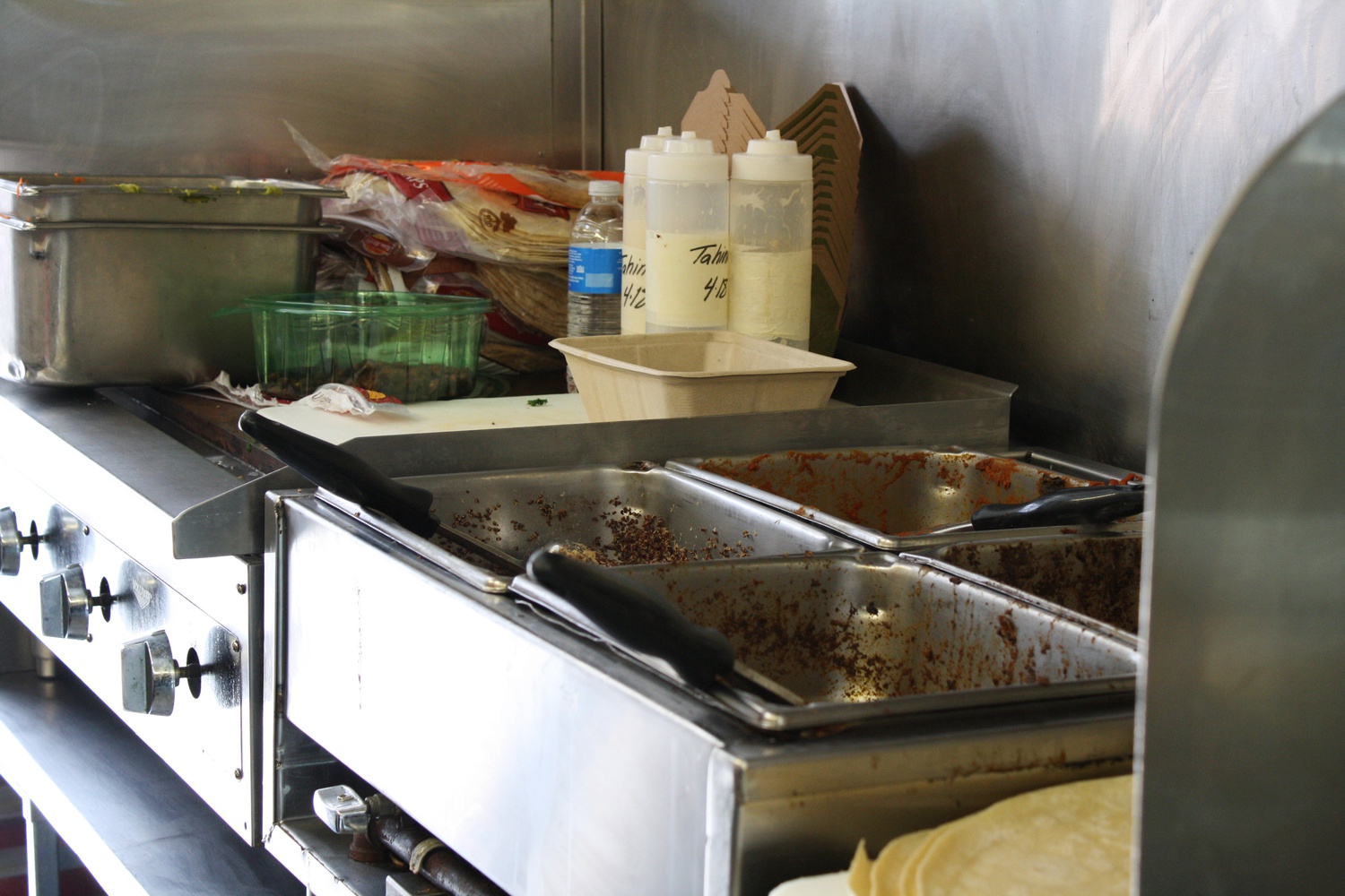 Food trucks prepare great quantities of food in cramped quarters daily for hungry customers. The Whole Foods Food Truck was completely sold out by 2pm on Wednesday afternoon.