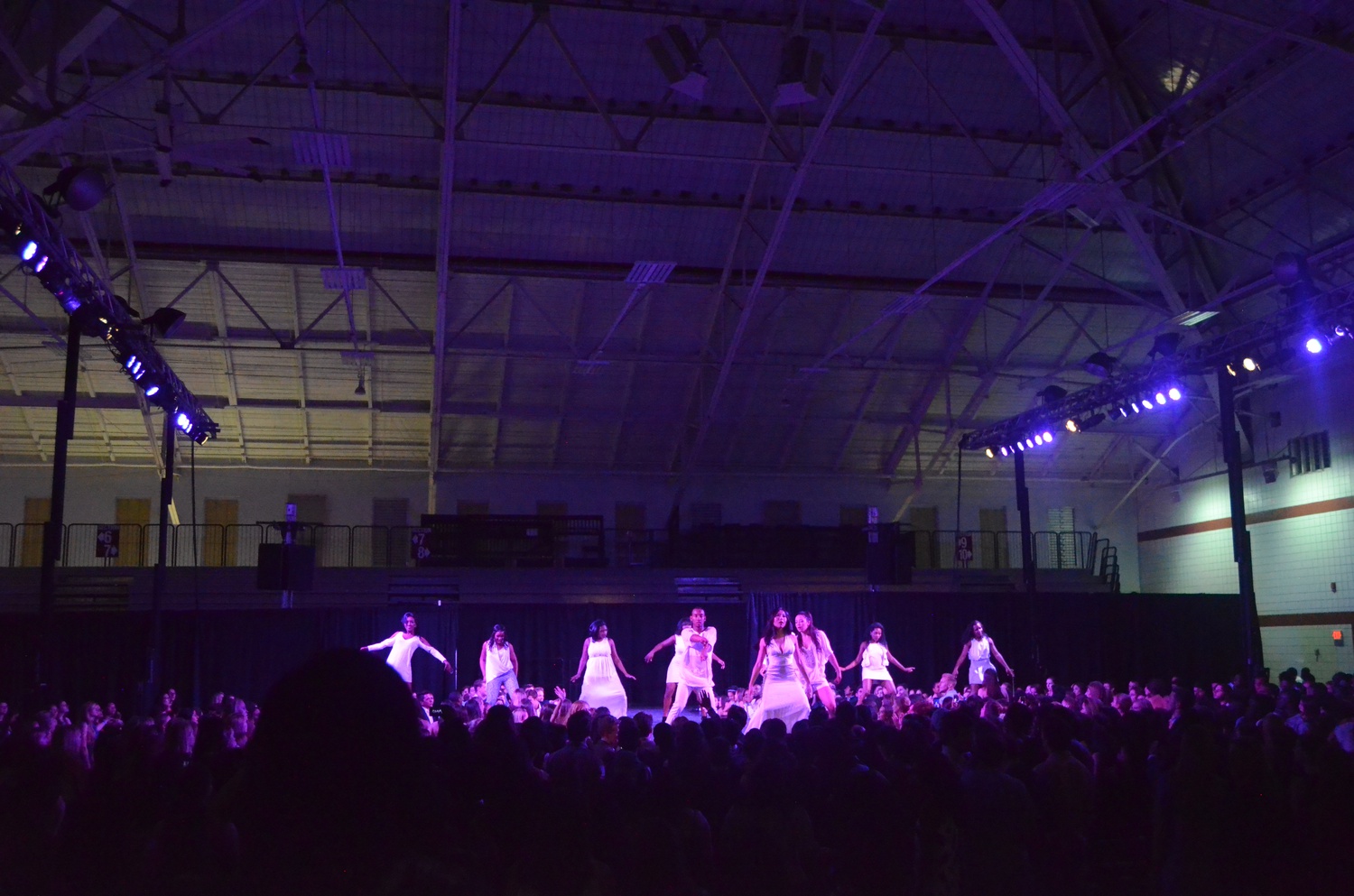 Students perform in campus charity fashion show Eleganza 2015: "Pandora's Box" at Lavietes Pavilion last Saturday evening. The show, which is one of the largest student events at Harvard University, sold out its performance, with all proceeds going to the Boston Center For Teen Empowerment.