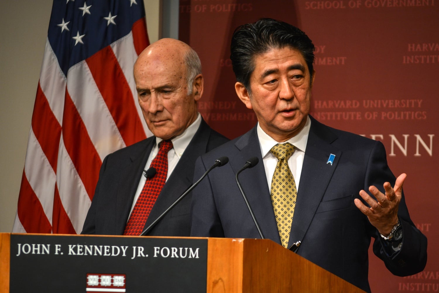 Japanese Prime Minister Shinzo Abe, next to Harvard’s Joseph S. Nye, responds to a question from the audience on Monday morning at the Institute of Politics. Abe, currently on a visit to the United States, touched upon topics such as economic development and international cooperations as well as more recent developments in women’s rights. 