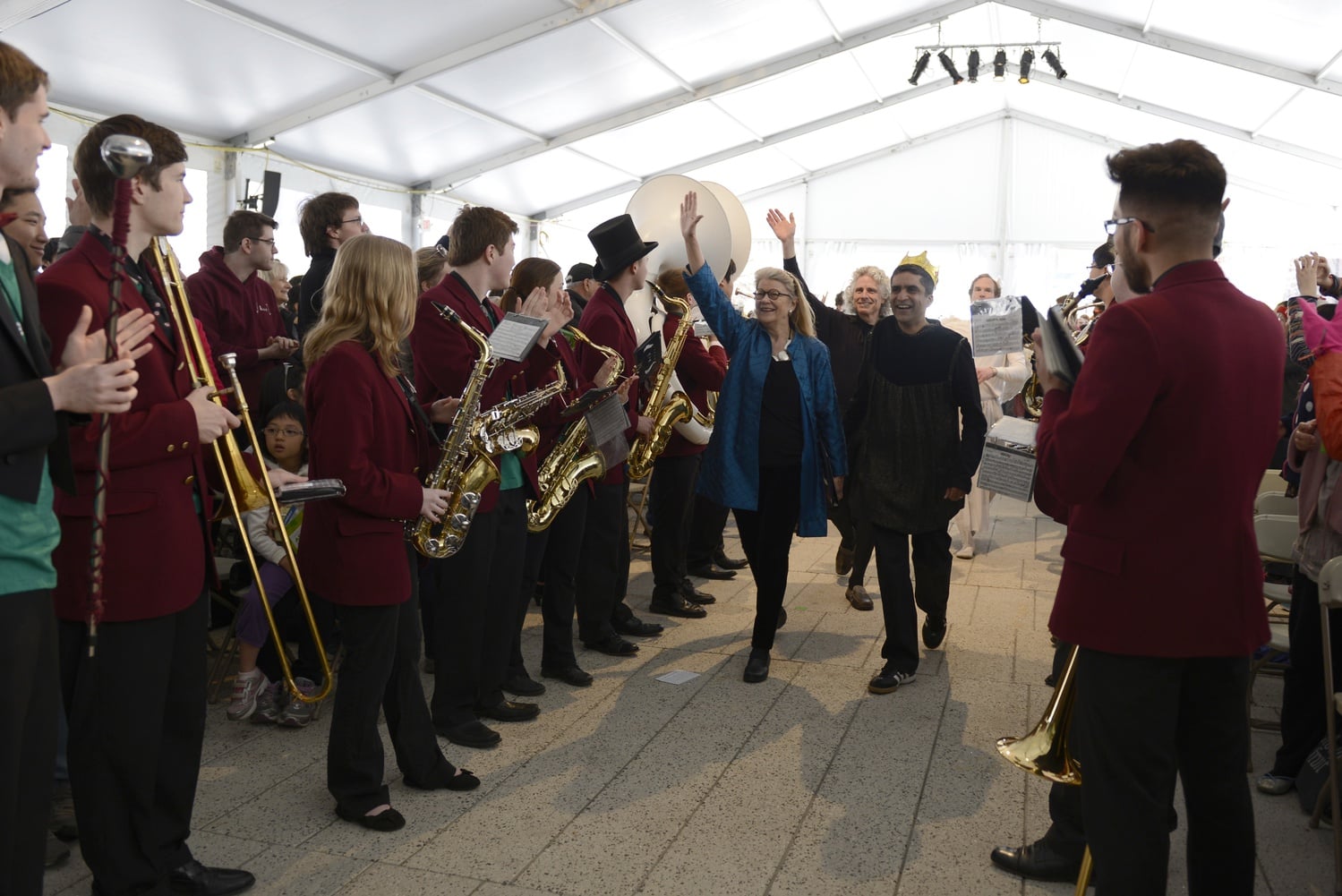 Diana L. Eck and Rakesh Khurana make a grand entrance into the Science Center Plaza for the performance “Swan Lake: For the Birds!” as part of the Arts First festival on Saturday.