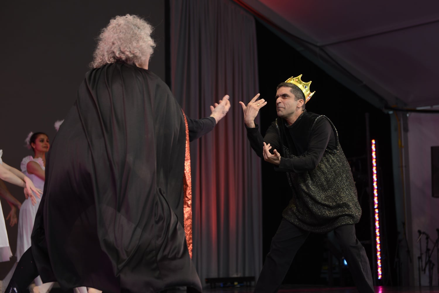 Dean of the College Rakesh Khurana, playing the Prince, prepares to kill the Sorcerer, played by professor Steven Pinker. 