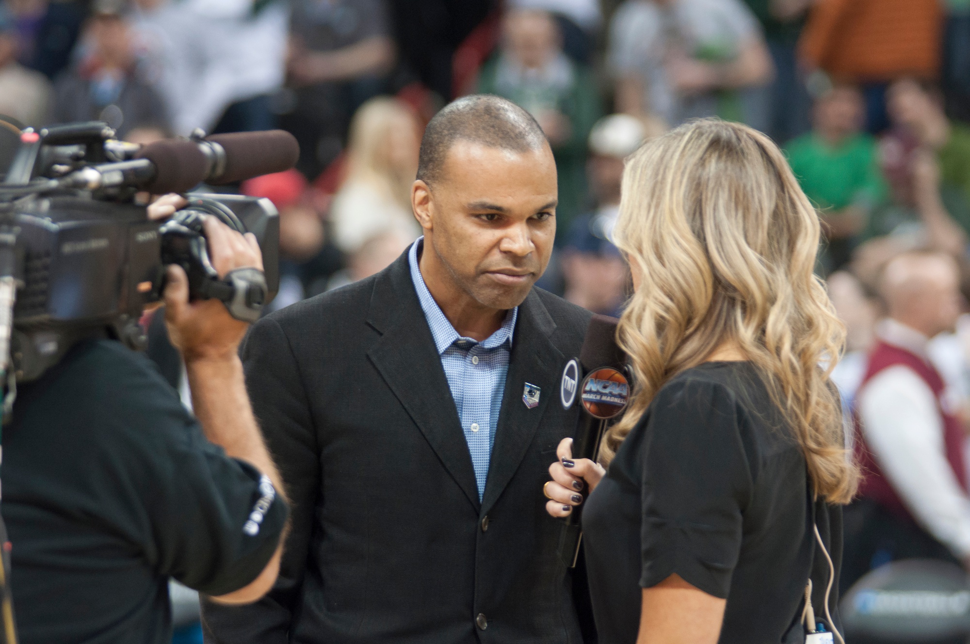 Harvard men's basketball coach Tommy Amaker, shown speaking with the media during the opening round of the 2014 NCAA Tournament, has reached the Big Dance in each of the last four seasons.