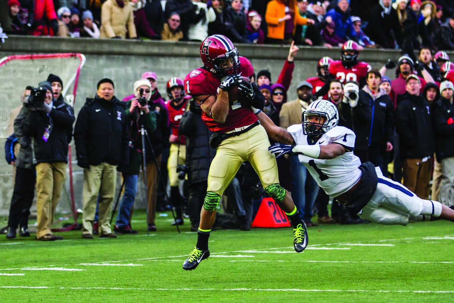 A last-minute touchdown catch for senior wide receiver Andrew Fischer propelled the Harvard football team to an Ancient Eight title over archrival Yale.