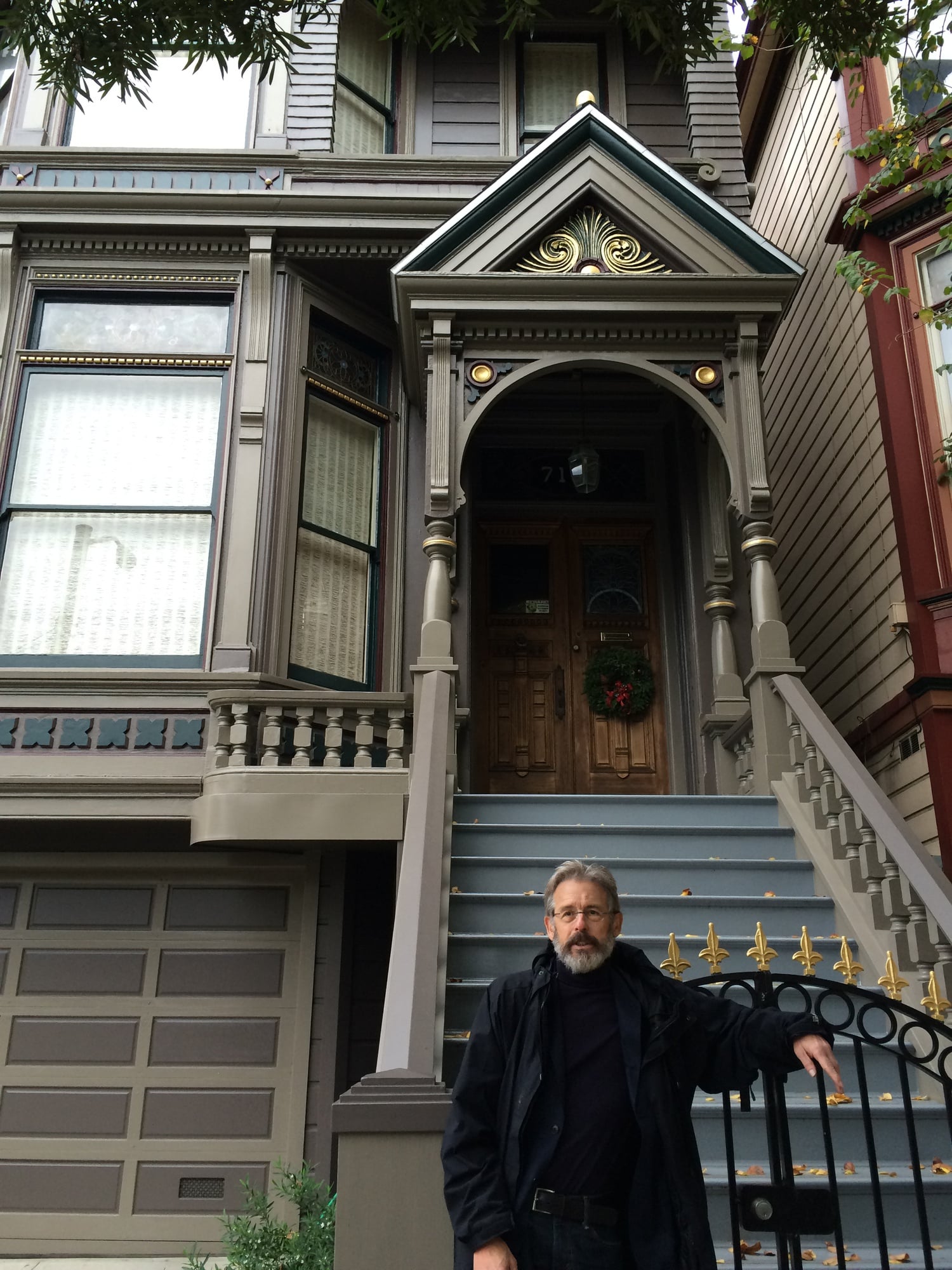 Former Crimson Managing Editor Hendrik Hertzberg ’65 poses in front of the house of Jerry Garcia of the Grateful Dead in San Francisco.