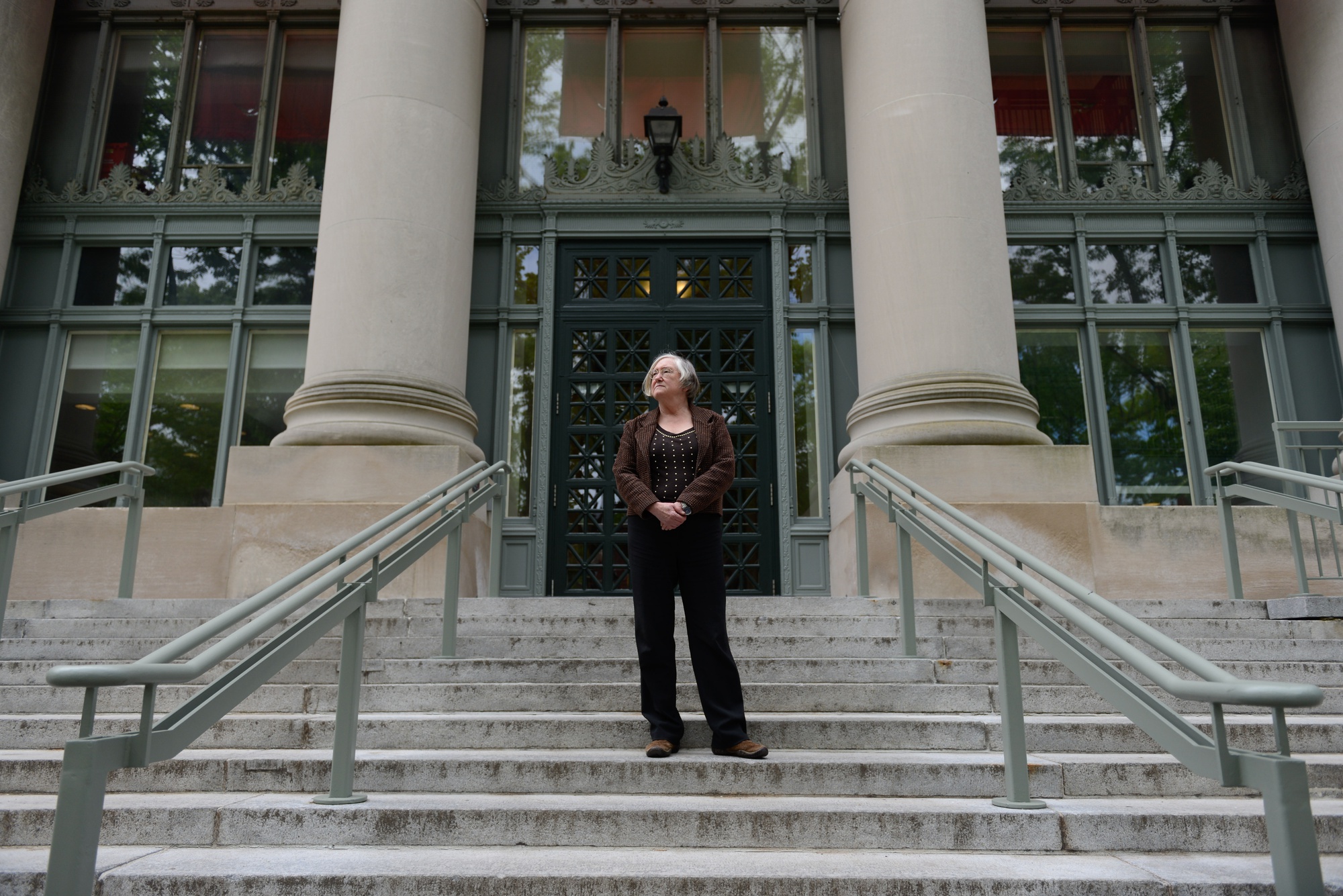 Janet E. Halley poses in front of the Harvard Law School library; Halley is a professor at the Law School who has pushed back against Harvard’s central Title IX policy.