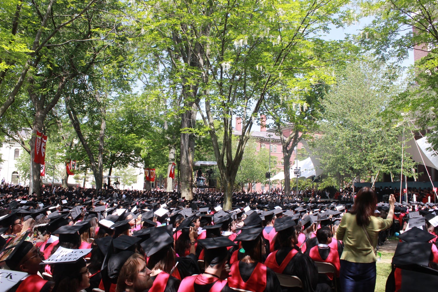 New and soon-to-be graduates sit in Tercentary Theatre during Commencement on May 28.