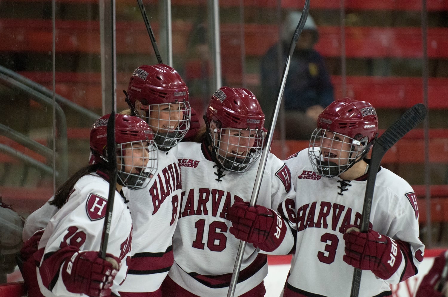 Junior forward Miye D’Oench (far left) celebrates during a 9-2 win over Boston University on Feb. 3 with three members of the Class of 2015—Hilary Crowe, Marissa Gedman, and Sarah Edney (from left to right).