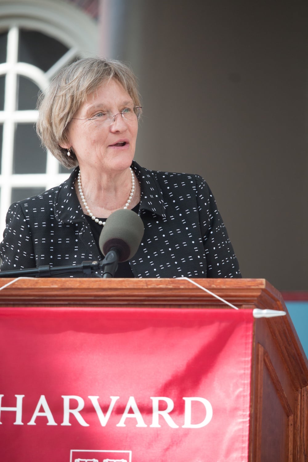 University President Drew G. Faust speaks at Commencement in 2015. Faust said she is excited to sing the updated lyrics to Harvard's alma mater at this year's Commencement.