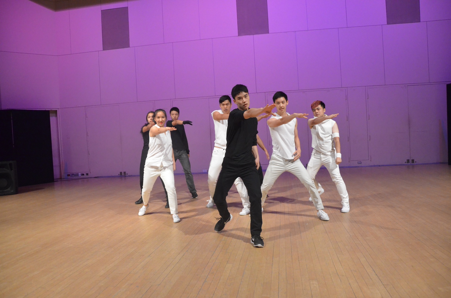 Members of Harvard's Asian American Dance Troupe perform to "Hyde" by VIXX at the CityStep Dance Jam on Saturday evening in Lowell Lecture Hall.