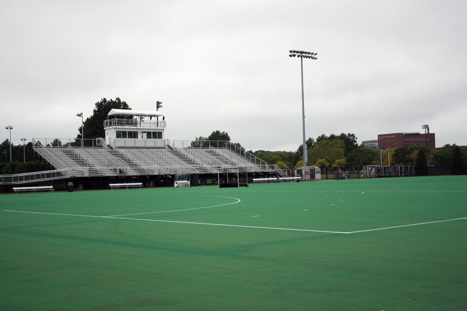 The above Harvard Field Hockey Stadium, built in 2000, had previously been named in honor of a gift by Gerald R. Jordan ‘61. The field hockey field’s namesake transitioned after Soldiers Field, a soccer and lacrosse field, was renamed to Jordan Field. 