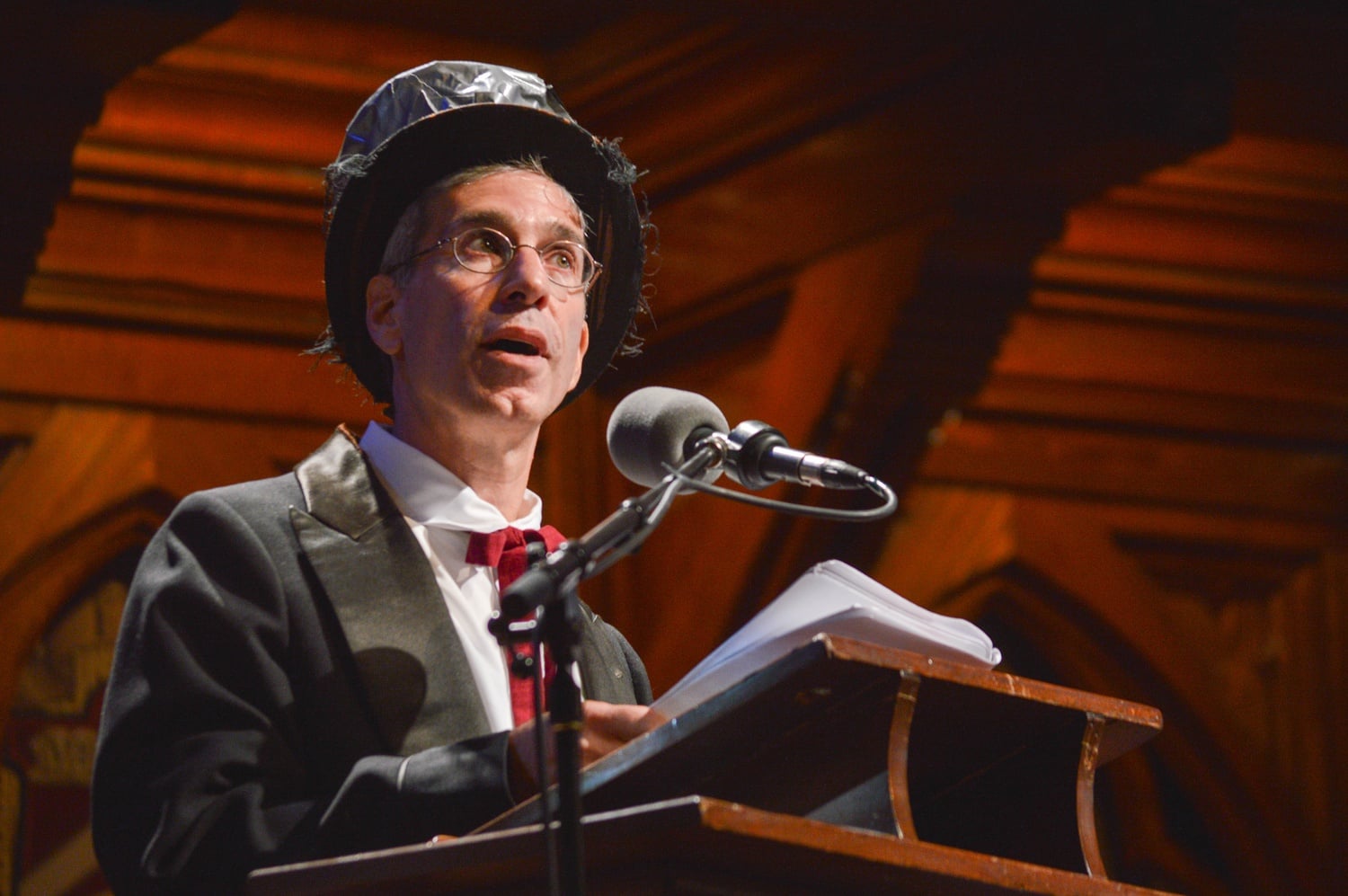 Master of Ceremonies Marc Abrahams, dressed in a suit and a top hat literally topped off with duct tape, announces the winners of the 2015 Ig Nobel Prizes. The extravagant event featured nobel laureates, musical performances, and former prize winners in a crowded Sanders Theatre. 