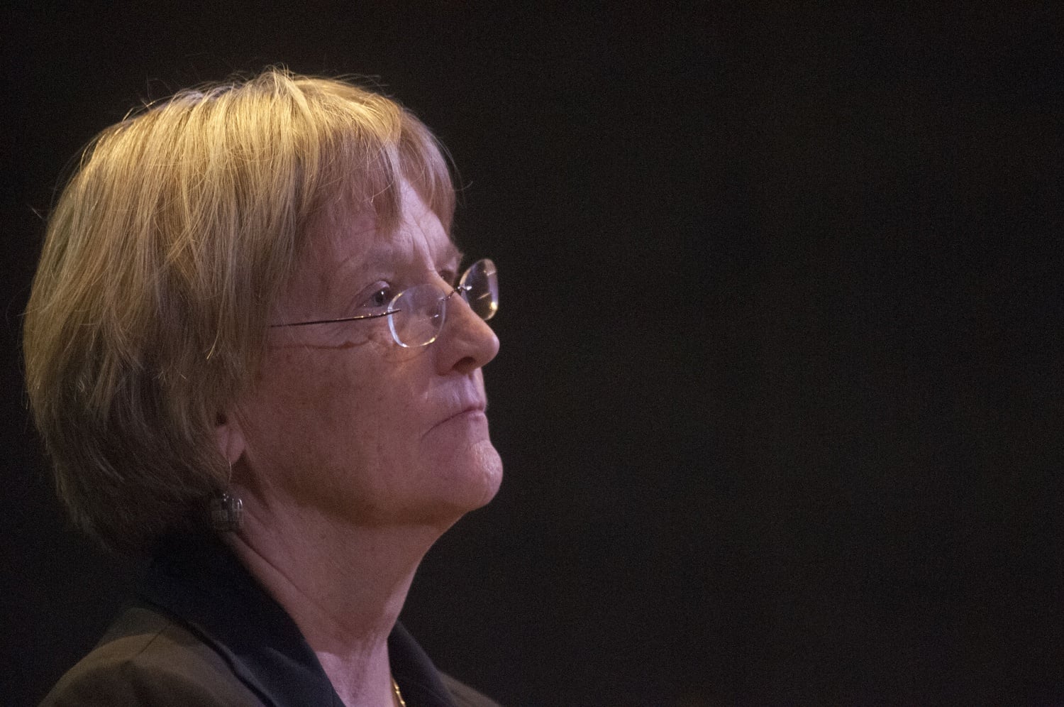 University President Drew G. Faust listens to comments during an open forum following the release of results of the sexual conduct climate survey on Monday.