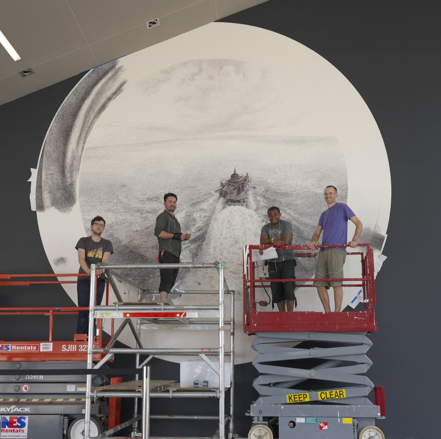 Artist Ethan Murrow and his crew as they prepare "Seastead" for the Institute of Contemporary Art.