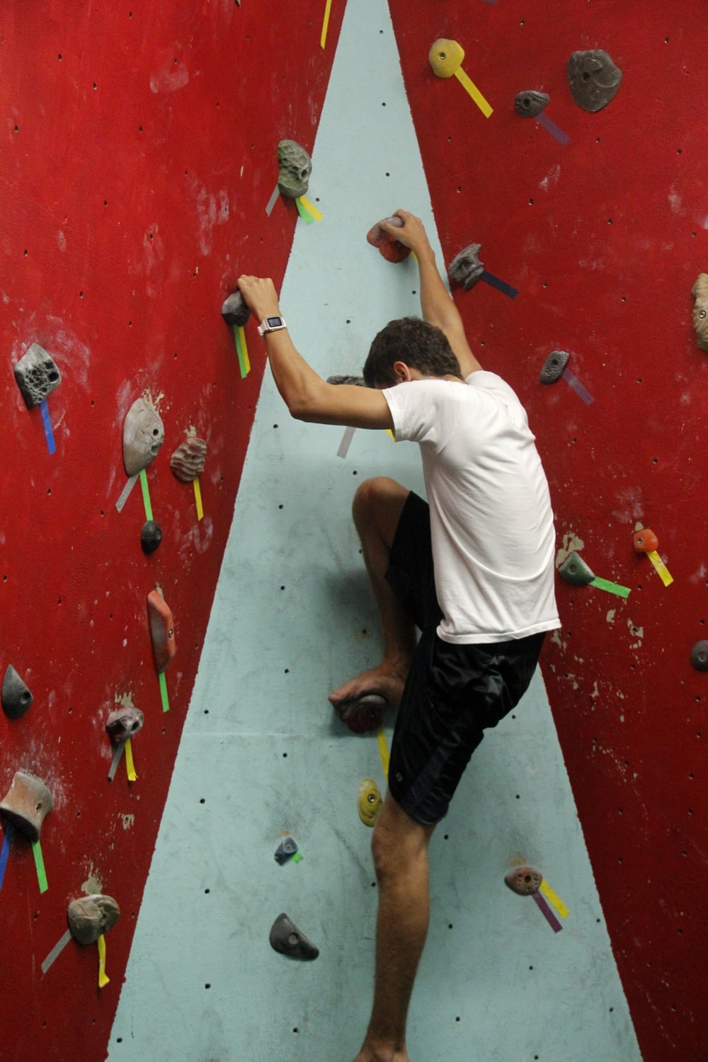 A member of the Harvard Mountaineering Club practices rock climbing on the Lowell Bouldering Wall on Tuesday evening. The club hopes that the wall will not be demolished during the House’s renovation in 2017-2018.