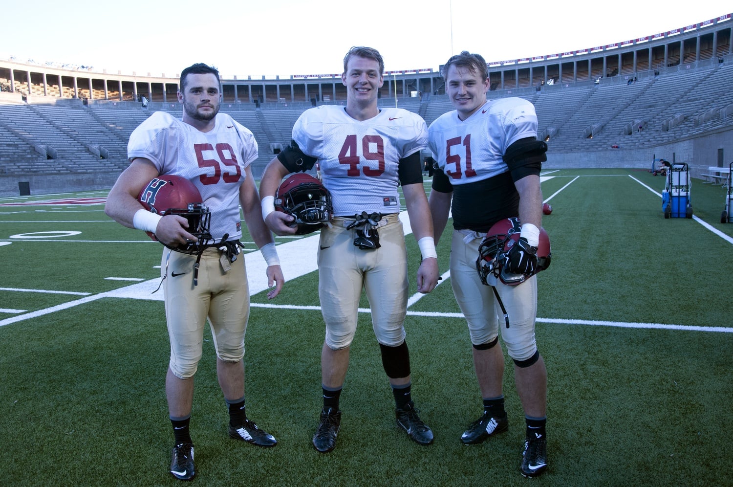 Led by captain Matt Koran (left), the Harvard defense will look to build upon a 2014 performance which saw the unit top the FCS in fewest points allowed. 