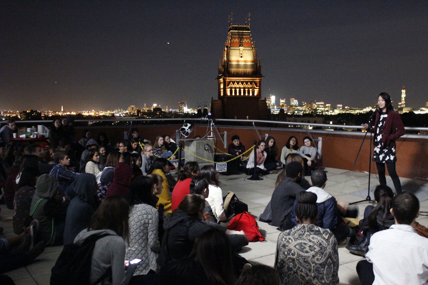 Jessica Jin ’18 showcases her writing at Celestial Open Mic, a spoken word performance hosted by student groups Speak Out Loud and STAHR in the Science Center Observatory. More than one hundred students attended the event on Friday night.