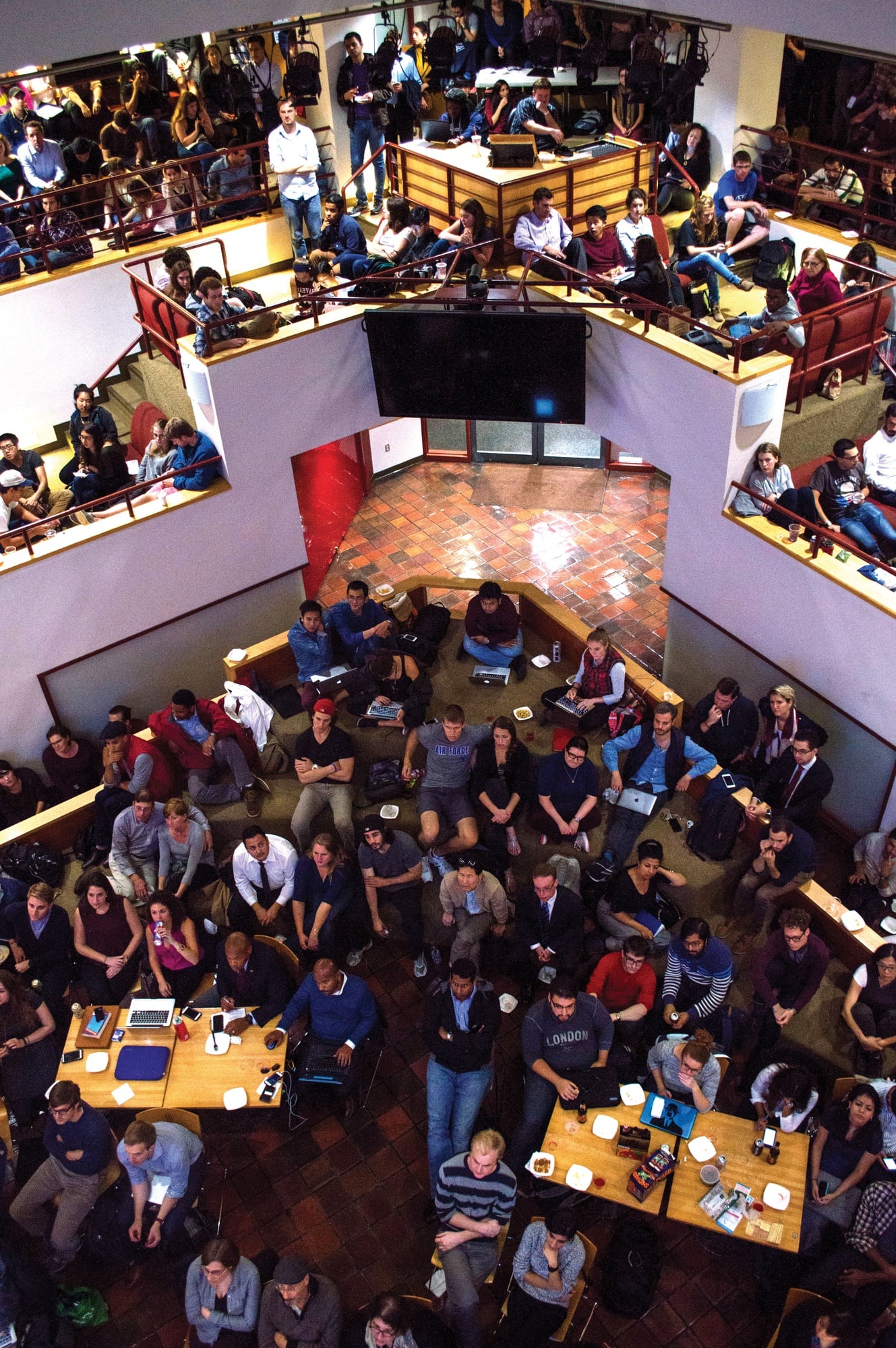 Students crowded the John F. Kennedy Jr. Forum to watch a screening of the Democratic presidential debate in Las Vegas on October 13, 2015. 
