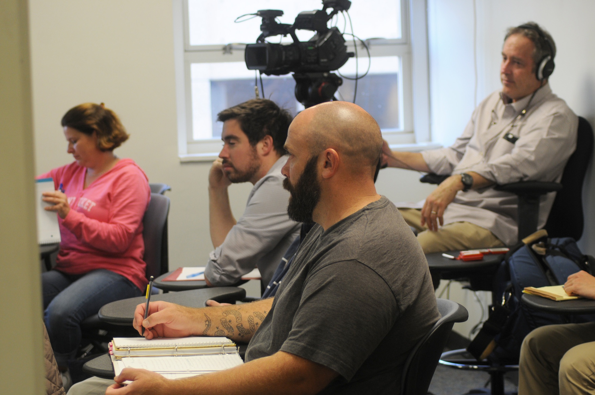 Extension school students participate in the class Math E-300 “Math for Teaching Arithmetic.” The class consists of both students who attend in person as well as students who engage online, via video.