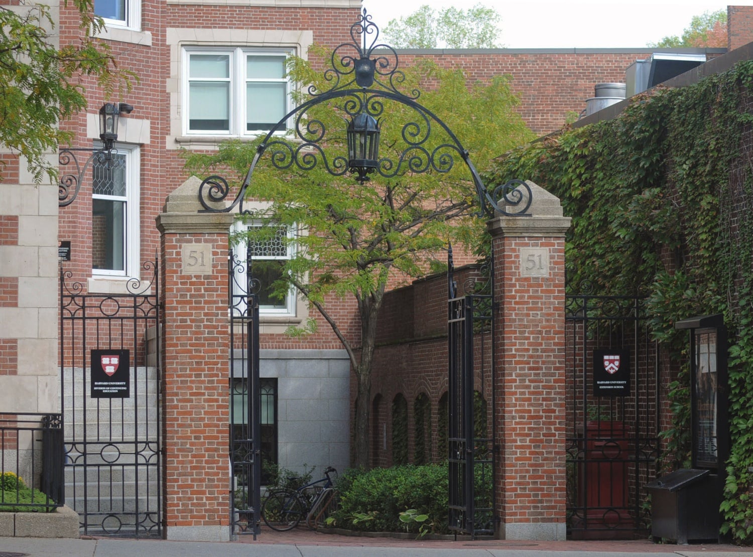 The gate entrance to the Harvard Extension School’s administrative offices, pictured in 2015.