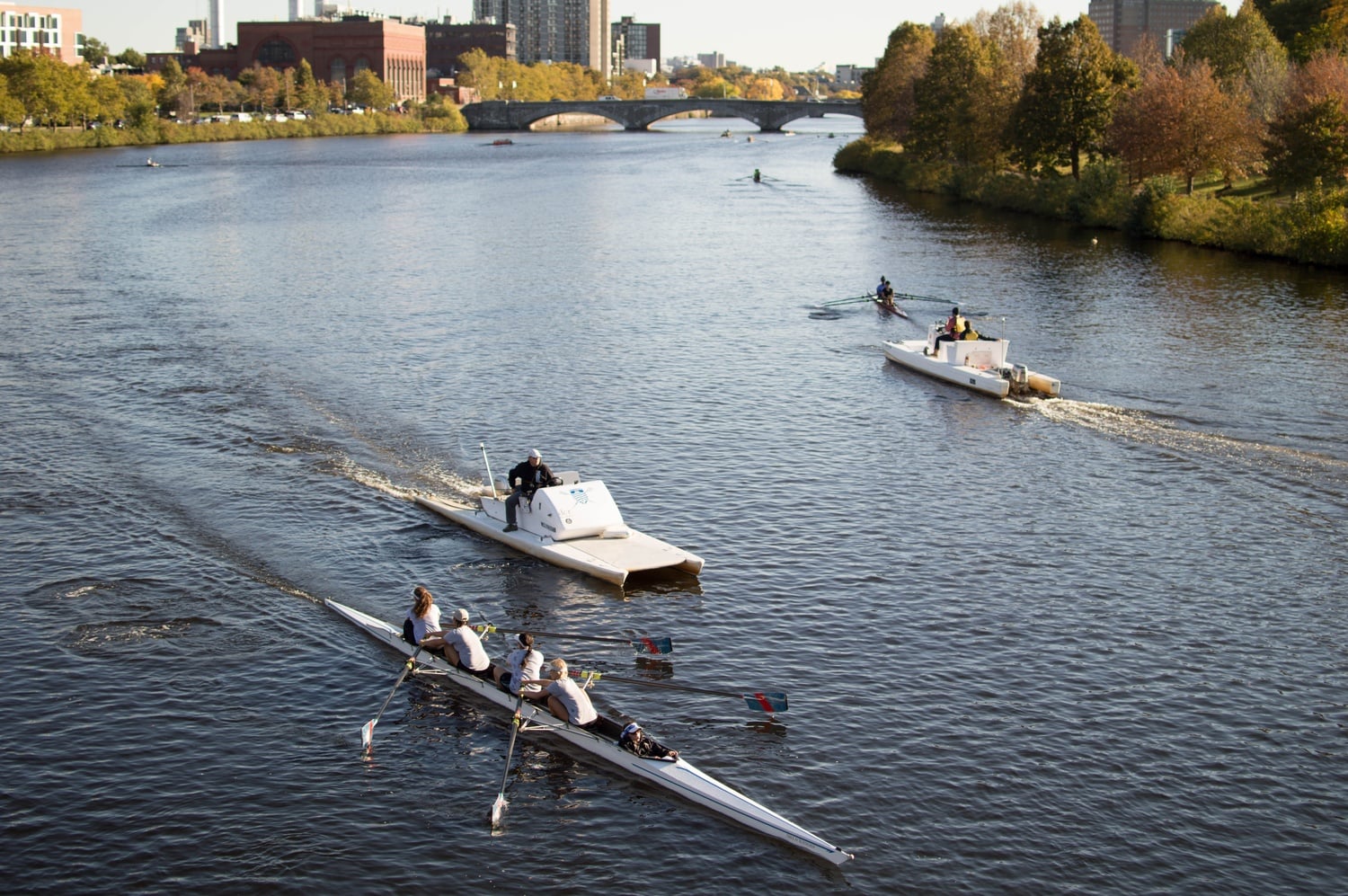Boats dot the Charles River in the days before this weekend’s Head of the Charles regatta. The annual two-day event features competitors from across the world, and is the biggest regatta of its kind. 
