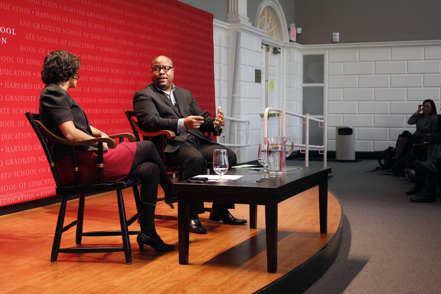 Natasha Kumar Warikoo, associate professor at the Graduate School of Education (left) interviews H. Richard Milner, a professor of education at the University of Pittsburgh (right) about the individual and institutional barriers to education experienced by many students of color. The panel was part of the Ed School’s “Fulfilling the Promise of Diversity,” a collection of conversations around equity and inclusivity in schools around the world.