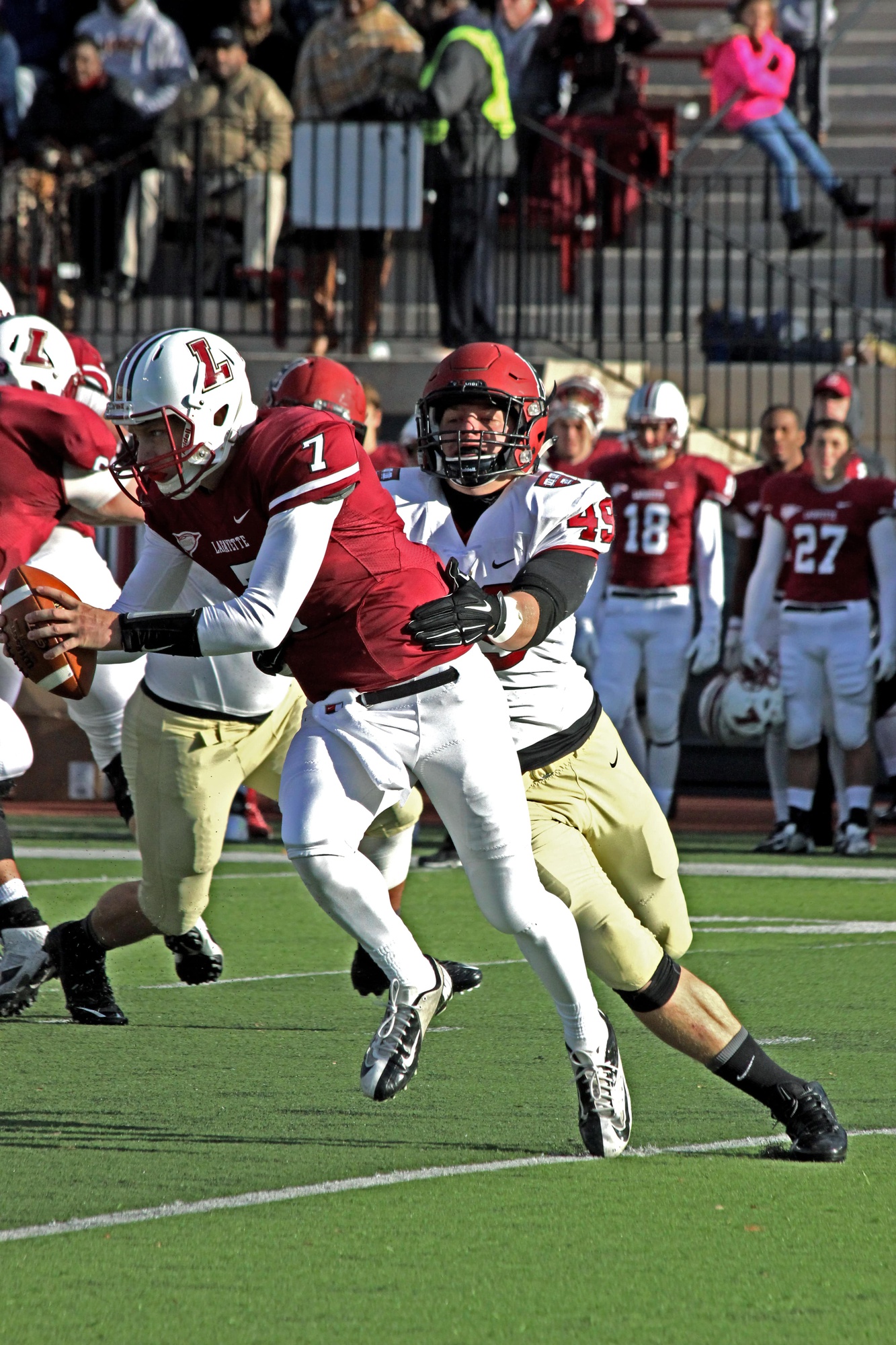 Senior linebacker Eric Medes wraps up Lafayette quarterback Drew Reed for a sack in the first half. Harvard went on to shut out the Leopards, 42-0.