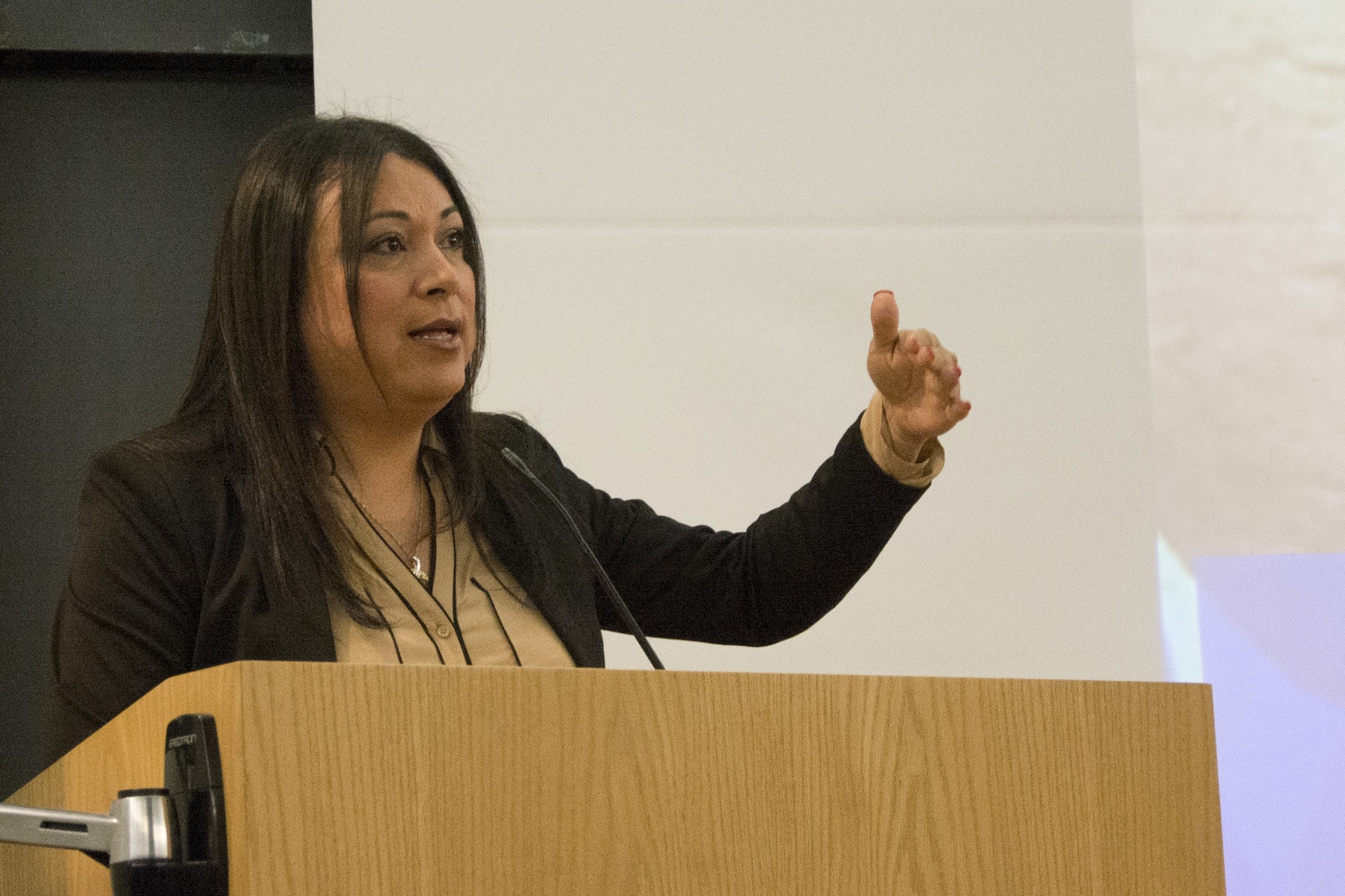 BGLTQ activist Jennicet Gutiérrez addresses an audience at the Yenching Auditorium on Monday evening. In her speech, Gutiérrez recounted her experiences as a transgender woman of color and advocate.